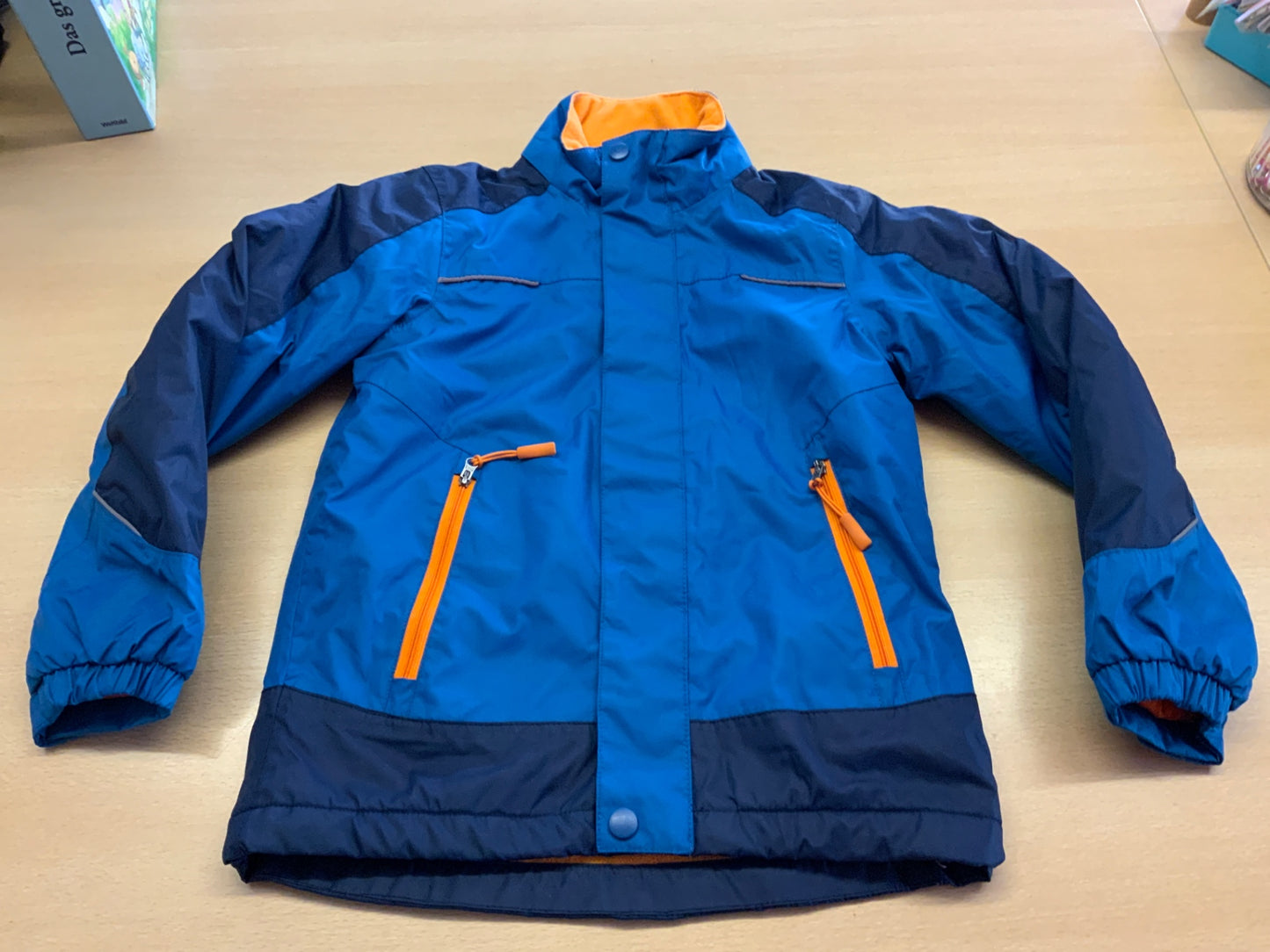 Regenjacke 128 Blau und Orange