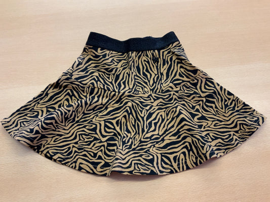 Rock 98/104 Beige und Schwarz