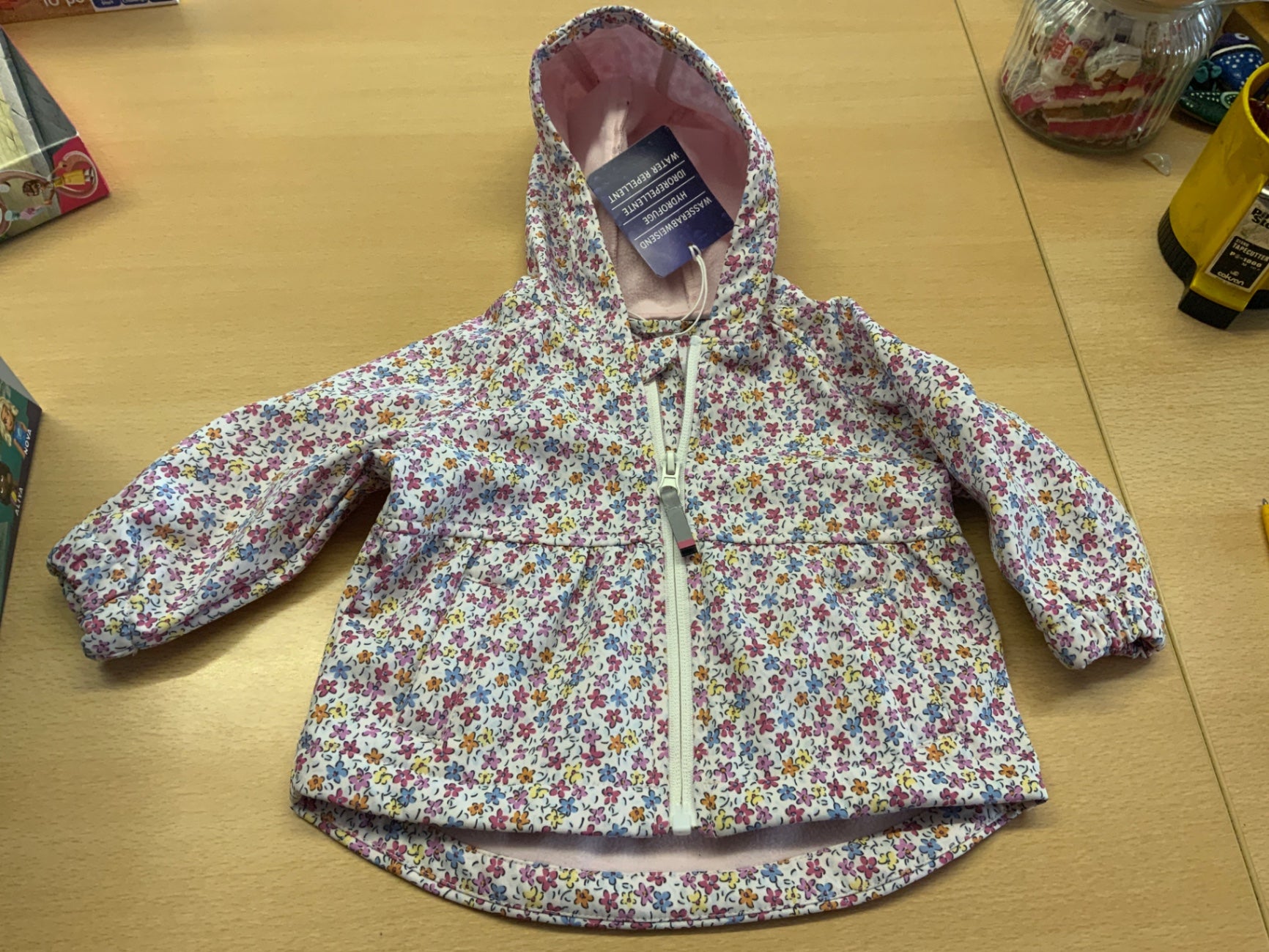 Regenjacke 68 Weiß mit buntem Blumenmuster