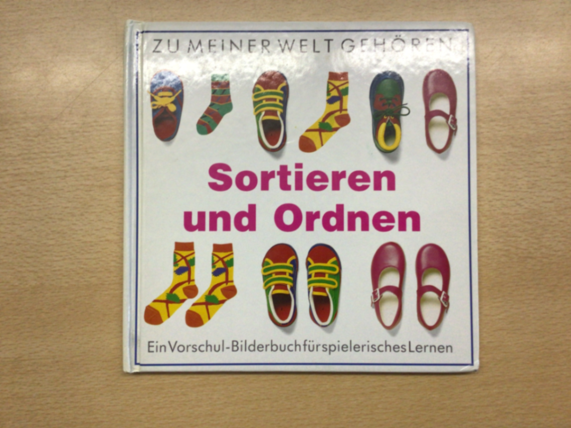 Buch Sortieren und Ordnen Bunt