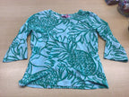 Langarmshirt 116/122 Türkis mit weißen Mustern