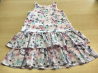 Kleid 122 Weiß mit Pastell- und Schwarzmustern