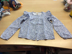Bluse 140 Hellblau mit weißem Muster