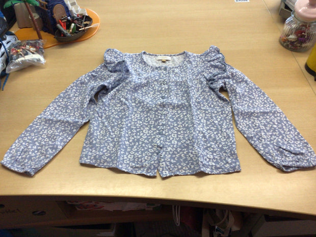 Bluse 140 Hellblau mit weißem Muster