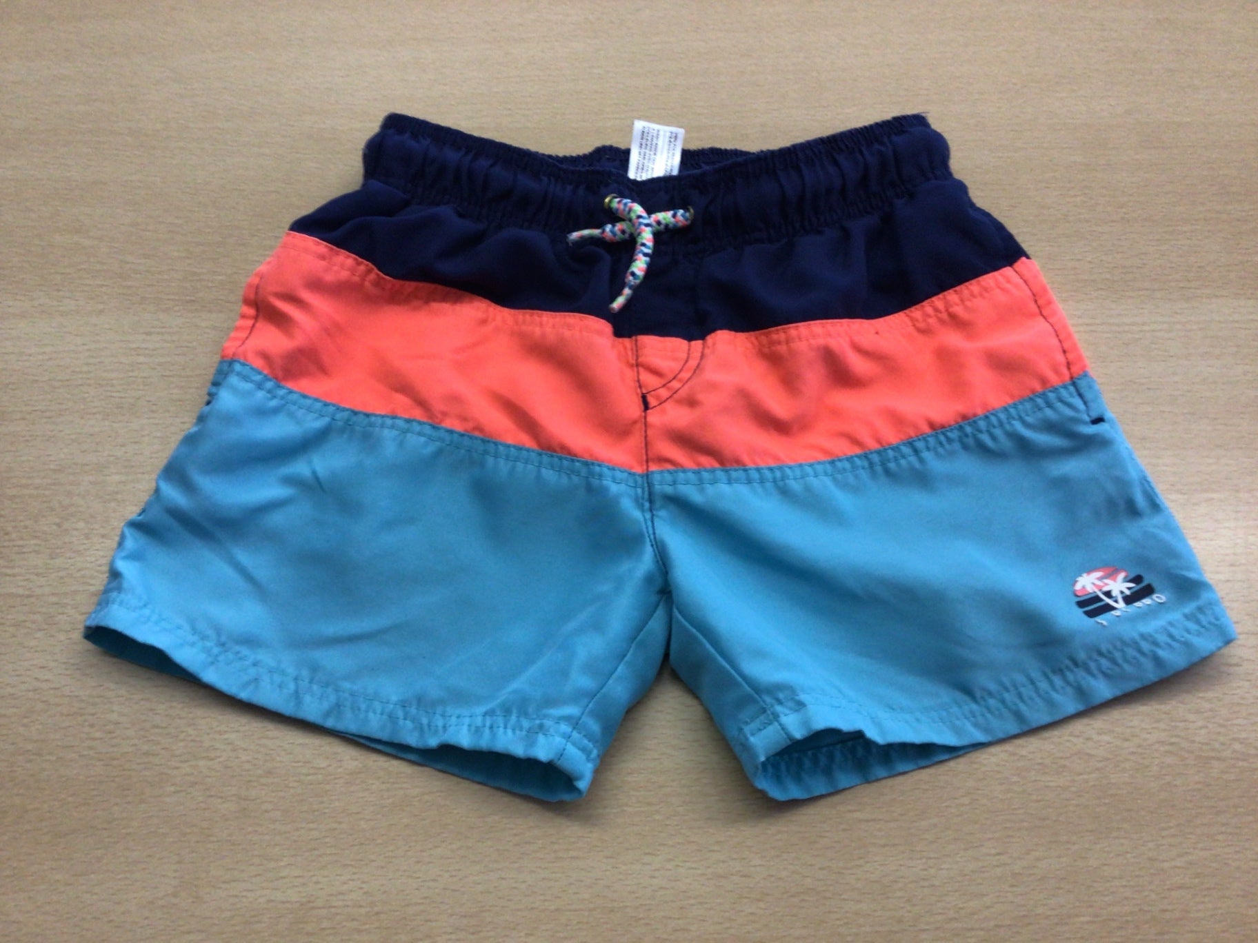 Bade-Shorts 110/116 Bunt (blau, orange, dunkelblau)